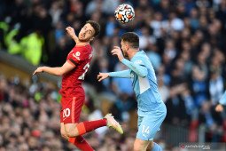 Liga Inggris: Liverpool dan Manchester City berbagi poin setelah berakhir imbang 2-2