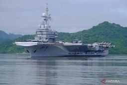 French aircraft carrier Charles de Gaulle docks in Lombok