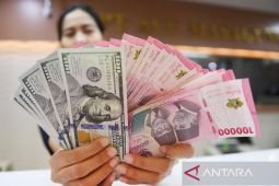 Kamis ini rupiah naik menjadi Rp16.609 per dolar AS