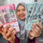 Kamis pagi rupiah melemah menjadi Rp18.075 per dolar AS