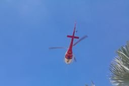 Pengeboman air untuk padamkan kebakaran Gunung Butak dihentikan akibat angin