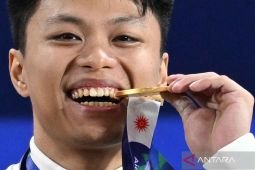 Emas dan rekor dunia Rahmat warnai perjuangan Indonesia