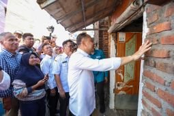 Menata rumah, merawat warga